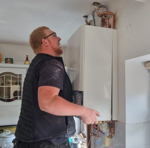 This is a photo of a new boiler being repaired in Buxton, Derbyshire by Buxton Plumbing